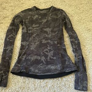Long sleeve Lululemon workout top camouflage in size four